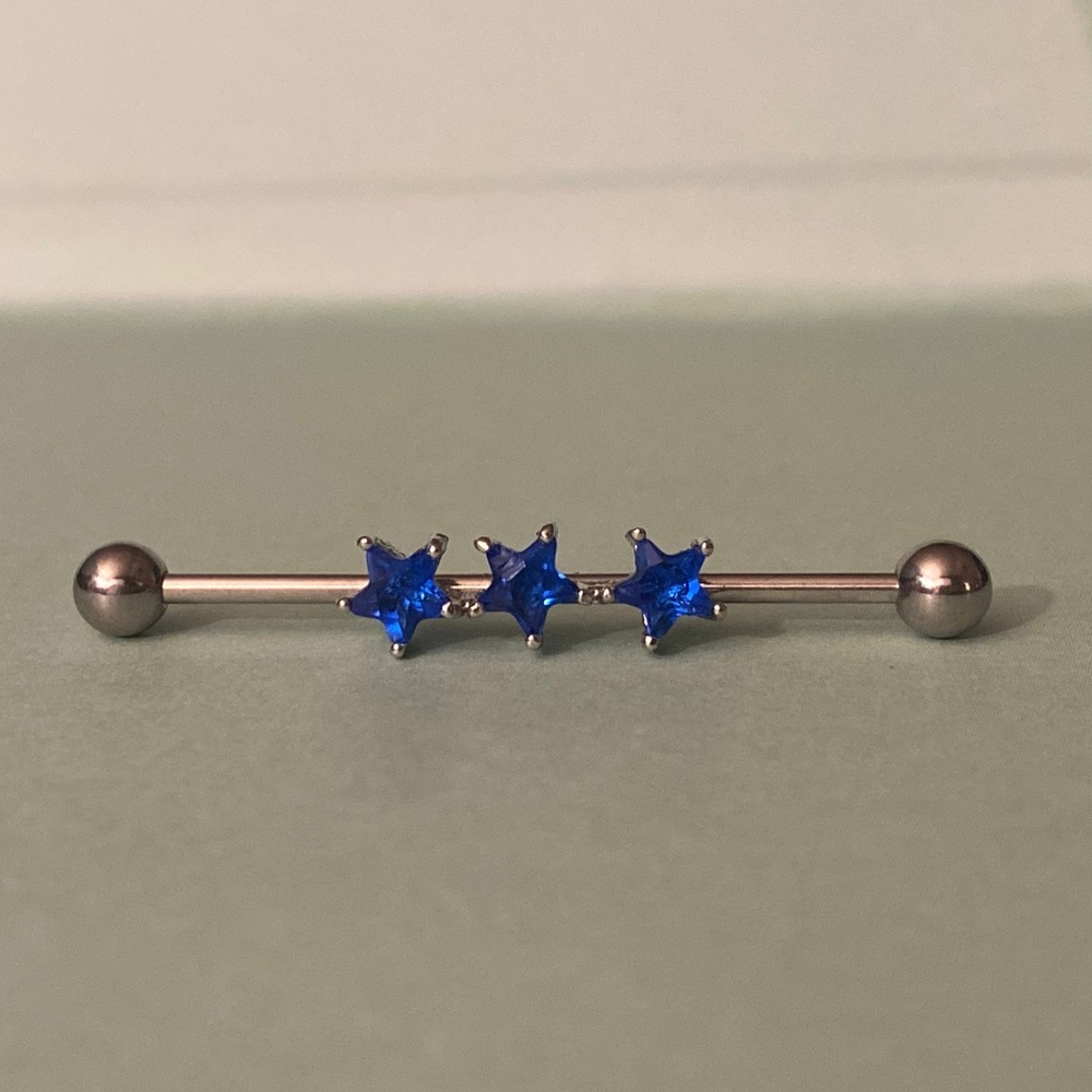 Gorgeous triple star Industrial Bar earring